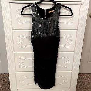 Black and sequin mini cocktail dress by Alice and Olivia